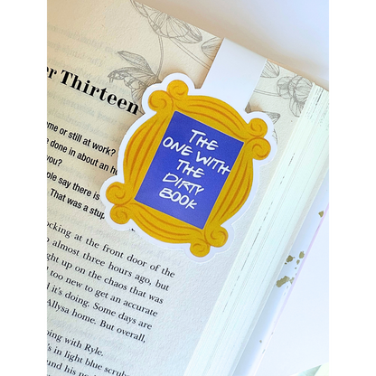 The one with the dirty book frame magnetic bookmark