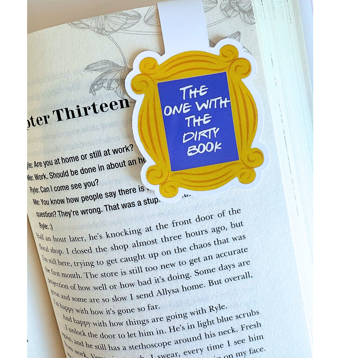 The one with the dirty book frame magnetic bookmark
